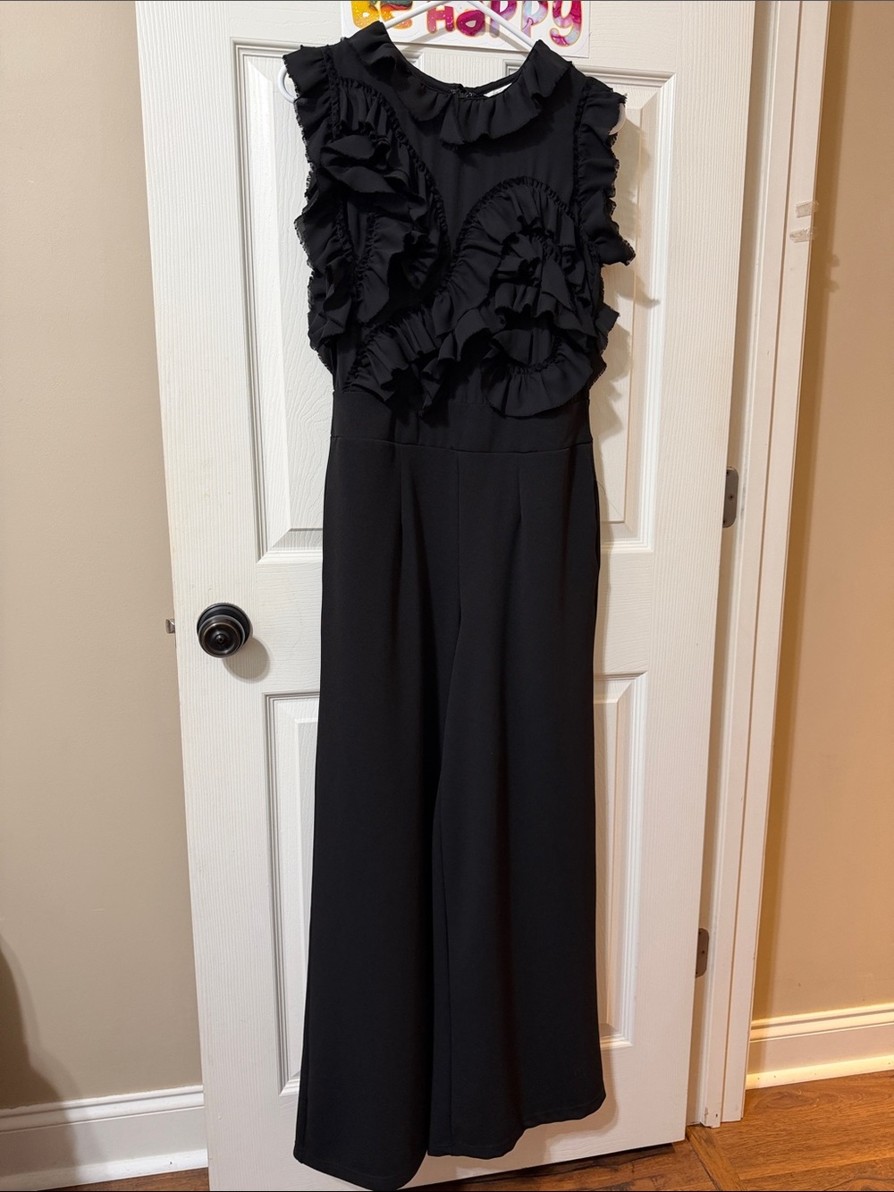 Black Ruffle-Front Sleeveless Jumpsuit